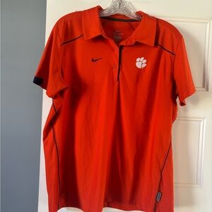 Nike Men’s Orange Polo with White Clemson Paw and Black Accents